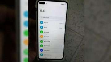 荣耀V30真机曝光：双牵涉开孔屏！屏幕开那么大孔，挺违和的